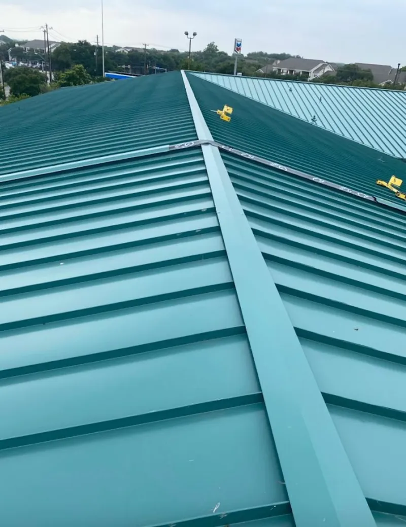Green commercial metal roof ridge and valley for Metal Roof Repair in Marengo