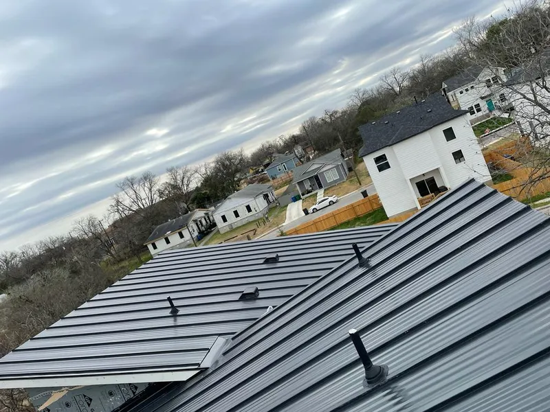 Standing seam metal roof panels with vents for Skylight Repair in Marengo